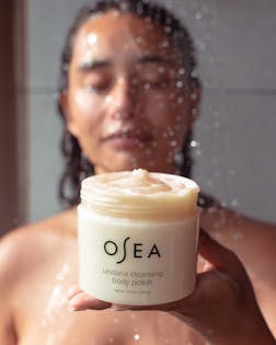 Undaria Cleansing Body Polish being used in the shower