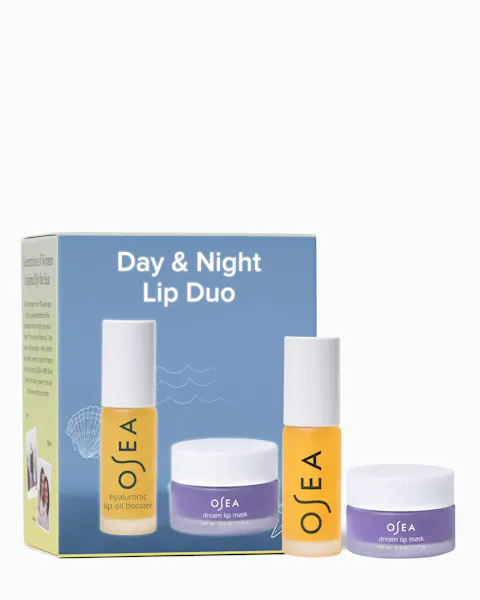 OSEA Day & Night Lip Duo packaging box beside its two full-size products, Hyaluronic Lip Oil Booster and Dream Lip Mask, on a white background.