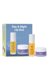 OSEA Day & Night Lip Duo packaging box beside its two full-size products, Hyaluronic Lip Oil Booster and Dream Lip Mask, on a white background.