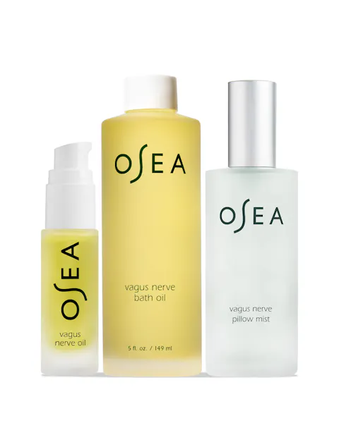 Three OSEA products including a bottle, a roller ball, and a spray bottle on a white background.