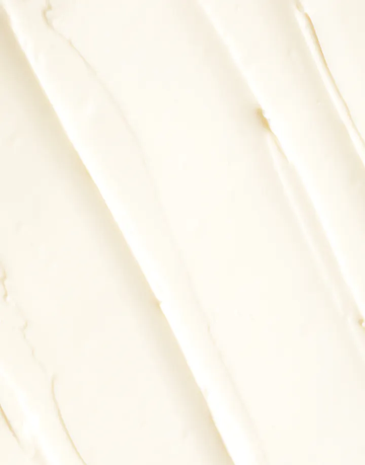 Creamy body butter texture close-up illustrating ultra-rich, smoothing formula