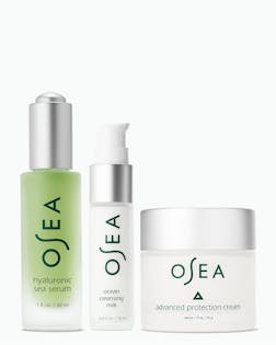 OSEA skincare product set including serum, cleansing milk, and cream on a white background