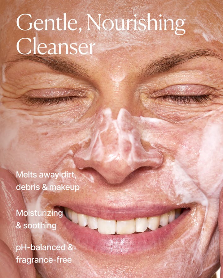 Close-up of a person applying a gentle nourishing cleanser to their face with text highlighting product benefits.