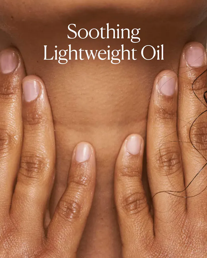 Close-up of hands with 'Soothing Lightweight Oil' text on a brown background
