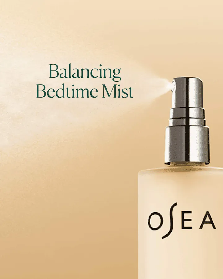Osea balancing bedtime mist bottle on a beige background