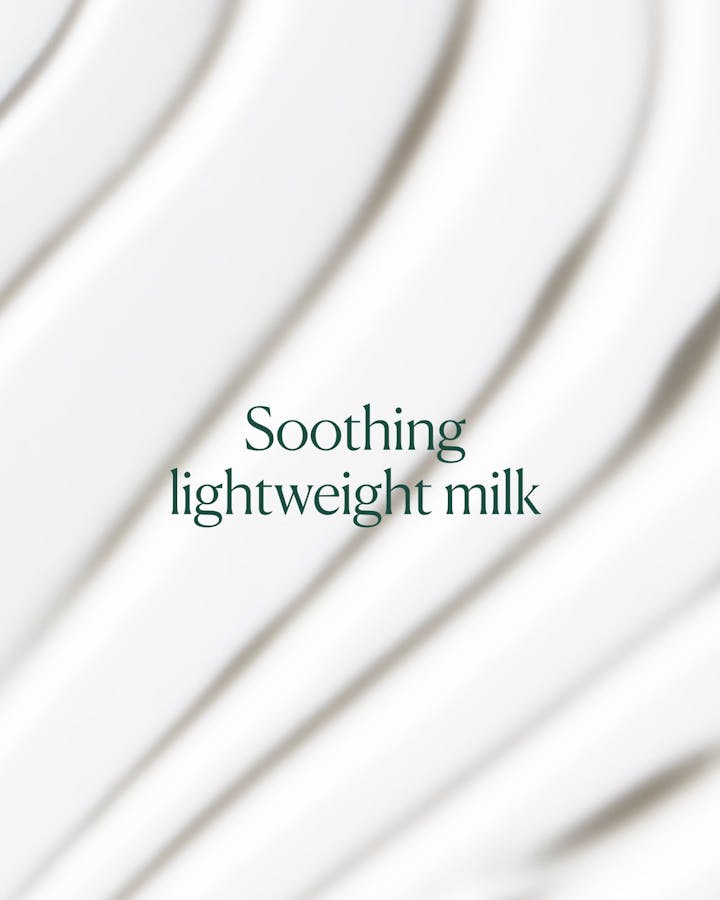 Text 'Soothing lightweight milk' on a white background with wavy lines