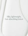 Texture close-up of silky, lightweight, fast-absorbing lotion