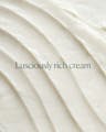 Close-up of rich, nourishing cream texture emphasizing ultra-hydrating formula