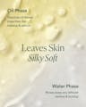 Close-up of dual-phase oil and water formula illustrating how it leaves skin silky soft