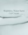 Close-up of weightless, water-burst gel cream texture with smooth, dewy finish