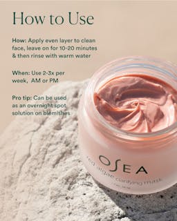 OSEA red algae clarifying mask jar with usage instructions on a textured beige background