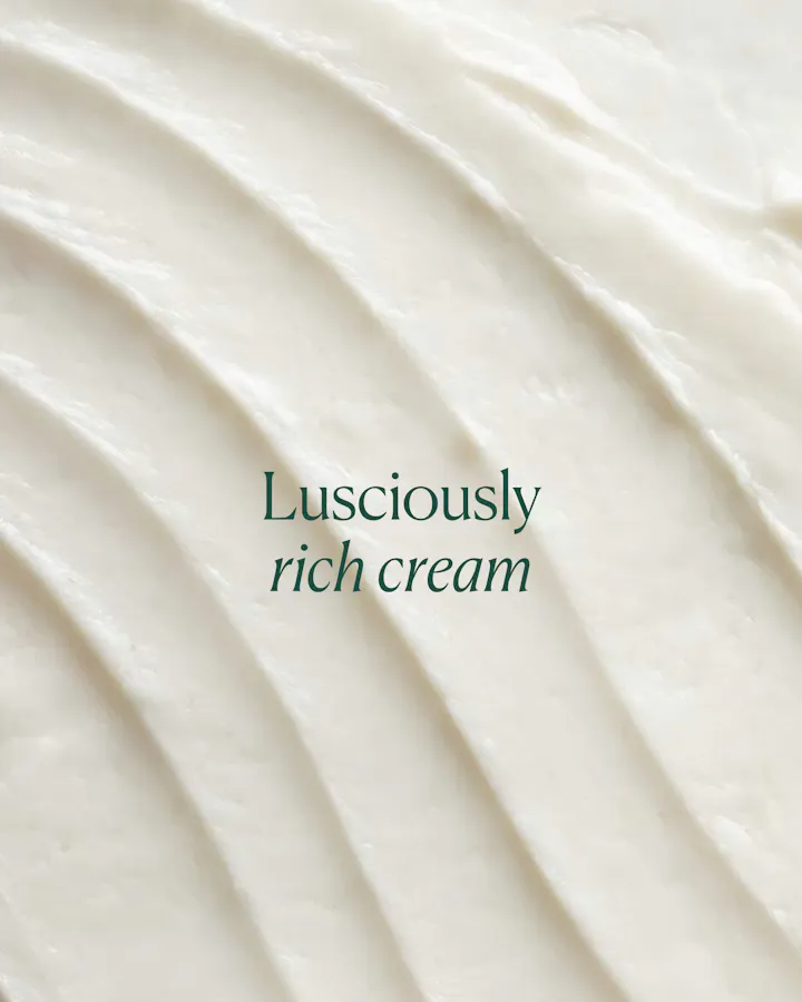 Close-up of luscious cream with text 'Lusciously rich cream' on a white background