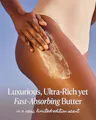 Close-up of a hand smoothing OSEA Undaria Algae Body Butter onto the hip and thigh, showing the rich, blendable texture, with text reading 'Luxurious, Ultra-Rich yet Fast-Absorbing Butter in a new, limited-edition scent.'