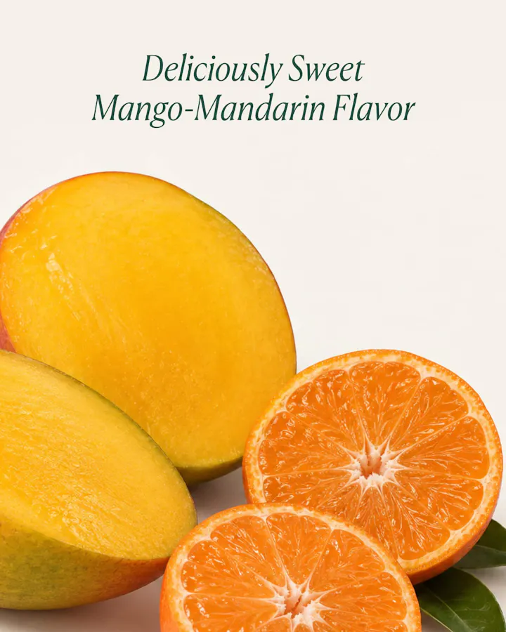 Halved mango and mandarin orange on a white background, with text reading 'Deliciously Sweet Mango-Mandarin Flavor.