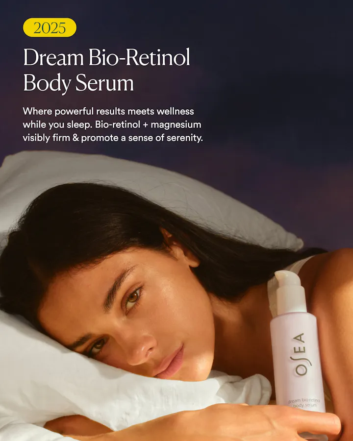 A woman lying in bed at night holds a bottle of OJEA Dream Bio-Retinol Body Serum. The image features a dark navy blue background with white text describing the product benefits, and a yellow '2025' badge in the top left corner.