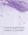 Close-up of the Dream Lip Mask's swirled purple gel texture, with text reading 'Luxurious gel texture, comforts & nourishes.