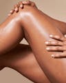 Close-up of smooth, radiant legs highlighting hydrated, glowing finish