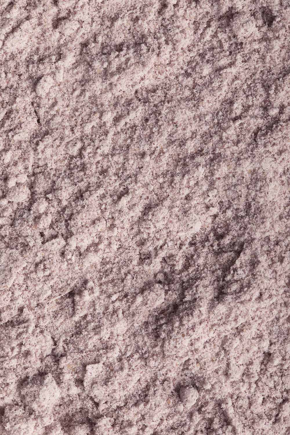 A Close Up Of A Light Purple Powder