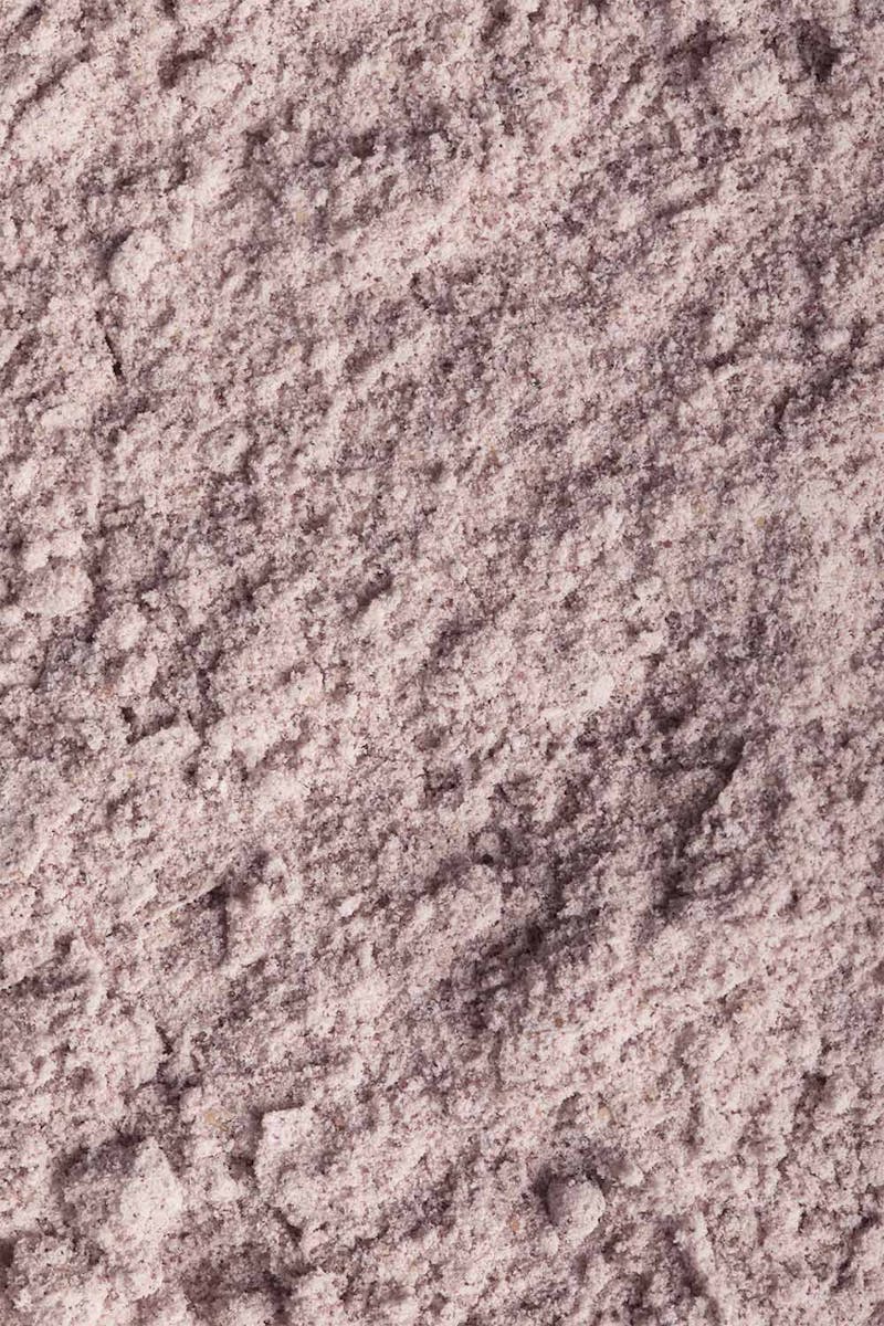 A Close Up Of A Light Purple Powder