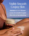 Person applying OSEA body cream on their leg with a beach background