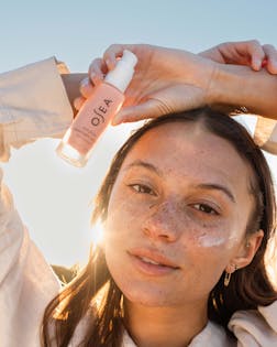 Seaglow Overnight Serum applied to model's face