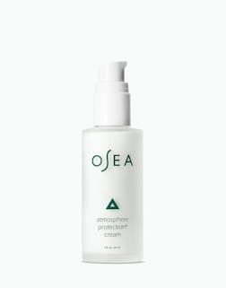A pump bottle of OSEA Atmosphere Protection Cream against a white background.