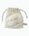 Reusable round OSEA cleansing pads stacked in a cotton mesh drawstring bag on white background