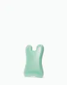 Mint green OSEA sculpting tool angled on white background showcasing curved edge design