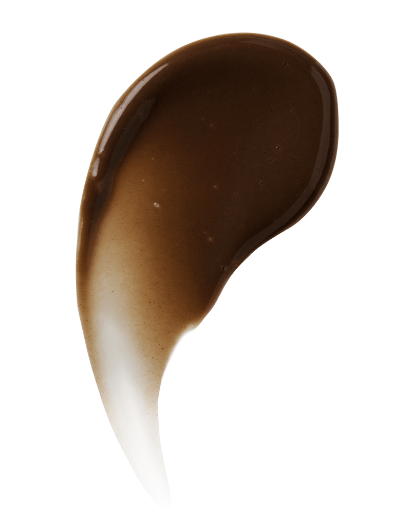 Swirl of Ocean Cleansing Mudd texture in deep chocolate-brown shade on white surface