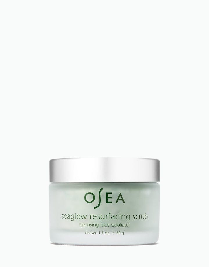 OSEA Seaglow Resurfacing Scrub in a frosted green jar with silver lid on white background
