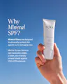 Osea sunscreen tube held in a hand with blue background and text about mineral SPF.