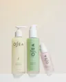 Three OSEA skincare products on a light beige background
