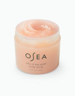 Opened jar of OSEA Salts of the Earth Body Scrub showing peach-toned, whipped exfoliating formula