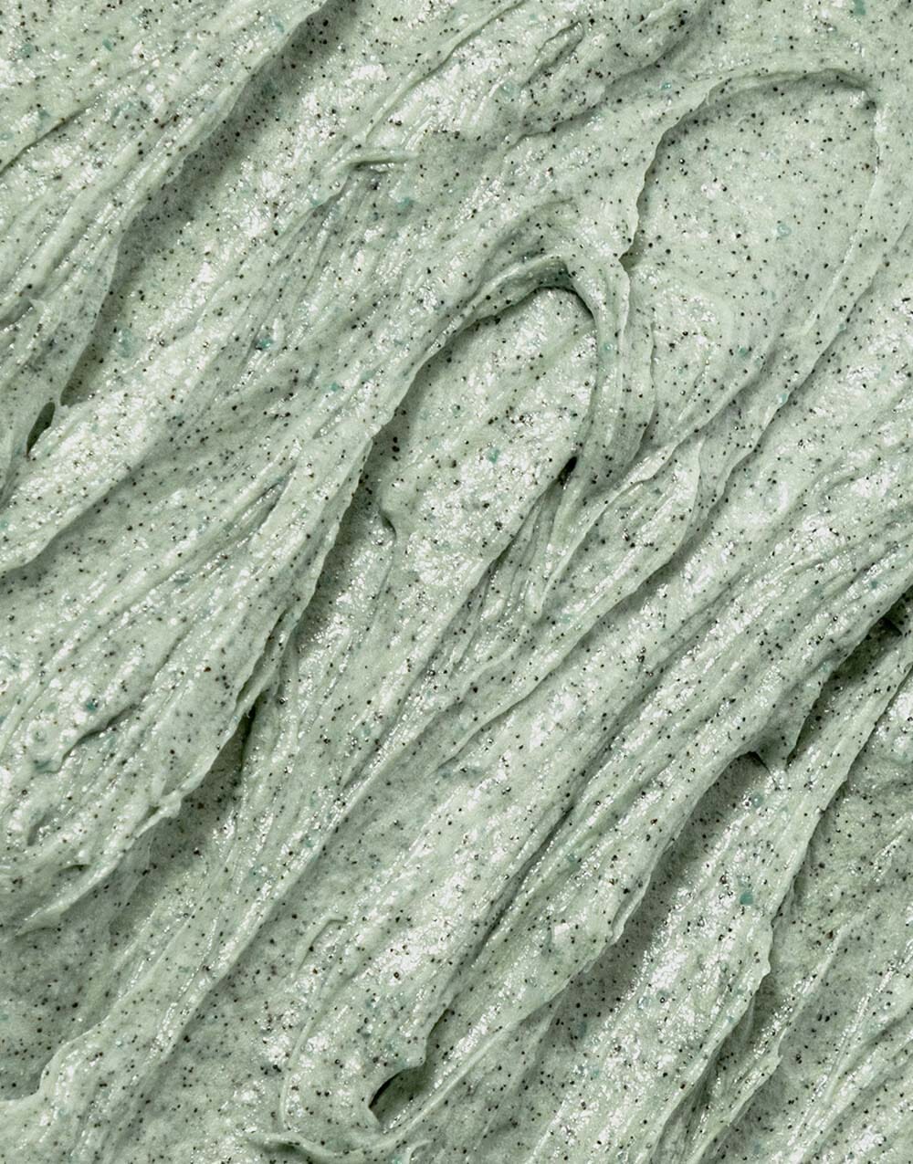 Macro texture of Seaglow Scrub with soft peaks and visible exfoliating particles