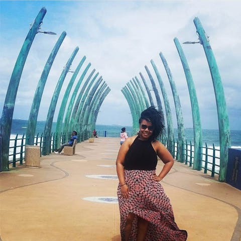 Person Posing For A Photo On The Pier