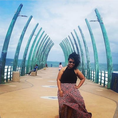 Person Posing For A Photo On The Pier