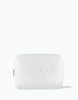White pouch with 'OSEA' branding