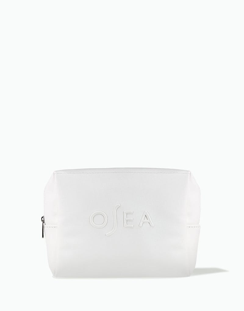 White pouch with 'OSEA' branding